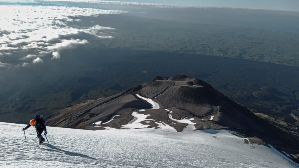 Mt. Taranaki, New Zealand is a great place to see snow and hike in the winter months - June, July, and August.