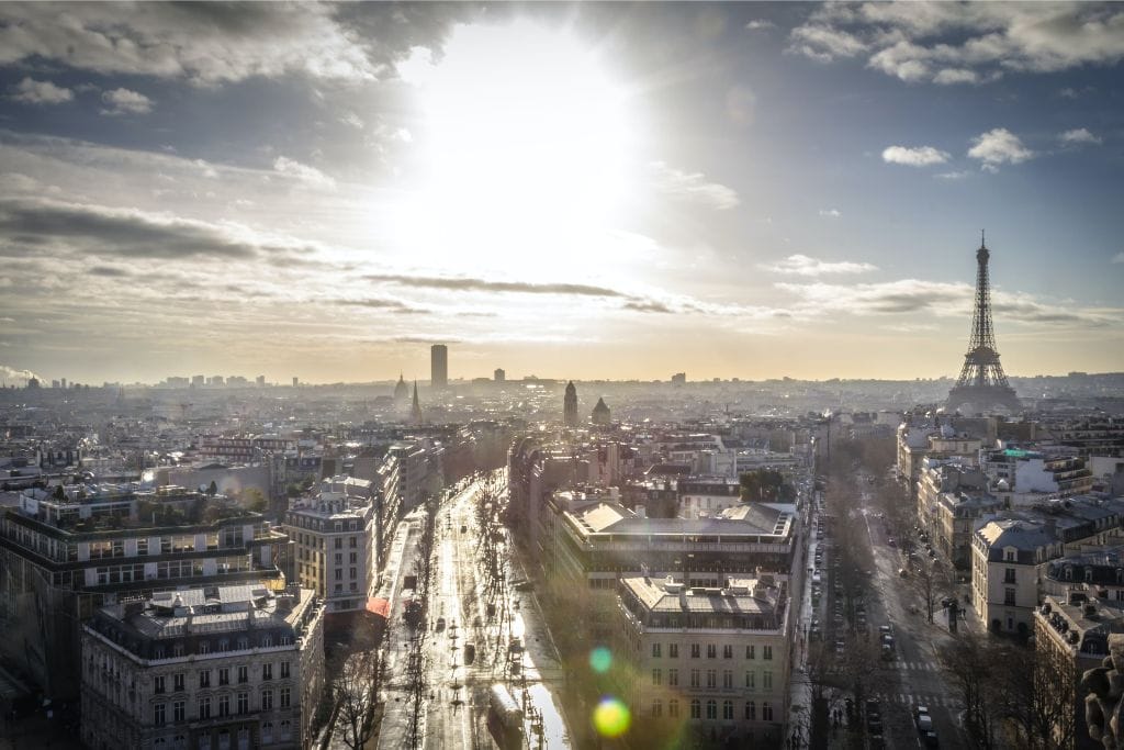 Picture of Paris in May with sunny skies and a view of the Eiffel Tower.