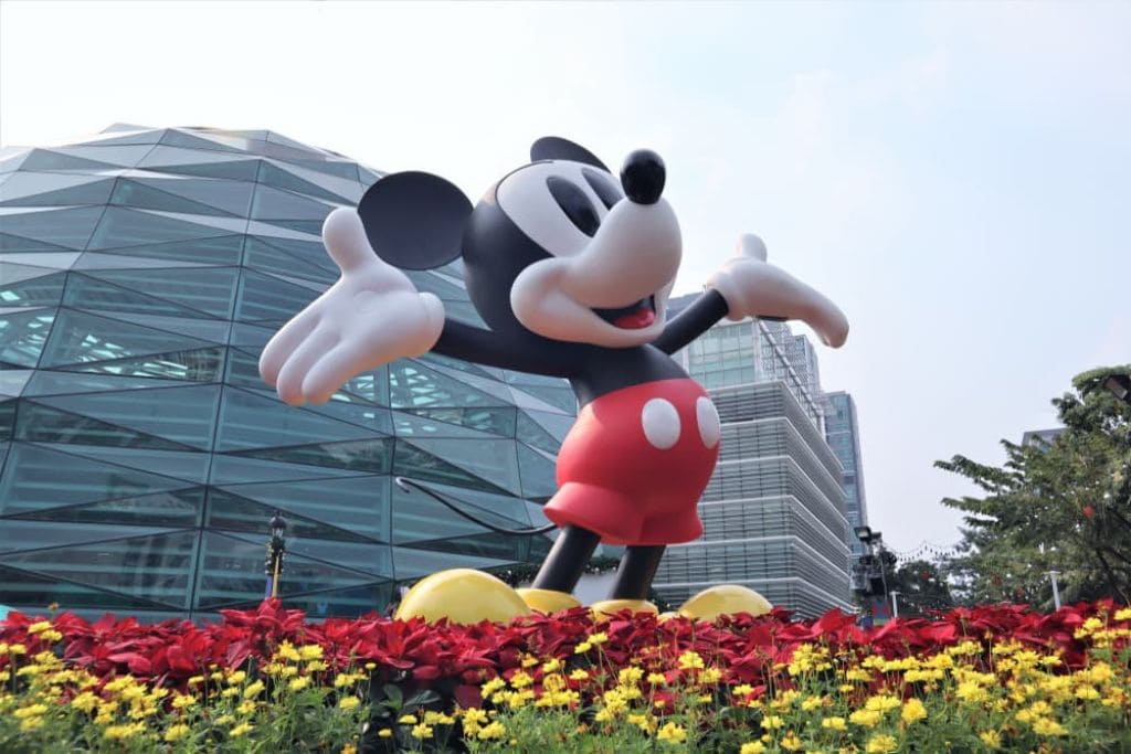 Statue of Micky Mouse welcoming all to Disney World in Orlando, FL where the first Space Mountain opened on January 15, 1975.