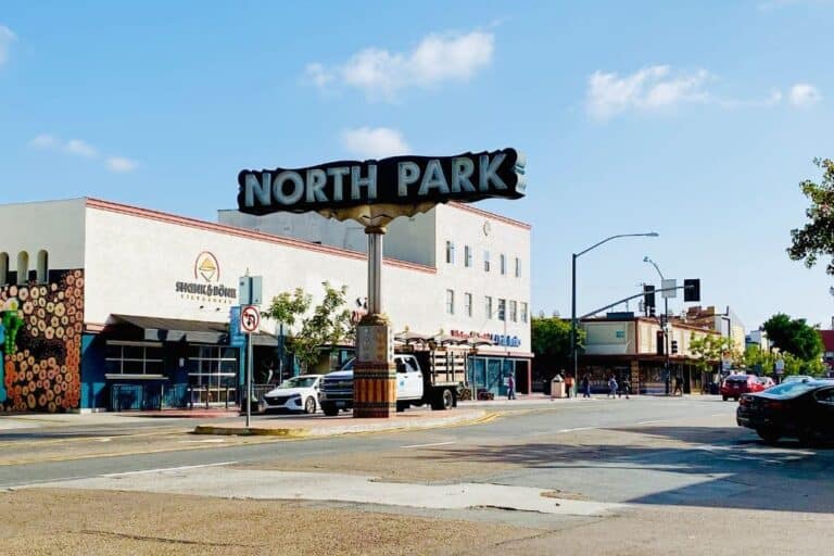 A street with a huge sign that reads, "North Park." In North Park in San Diego, California