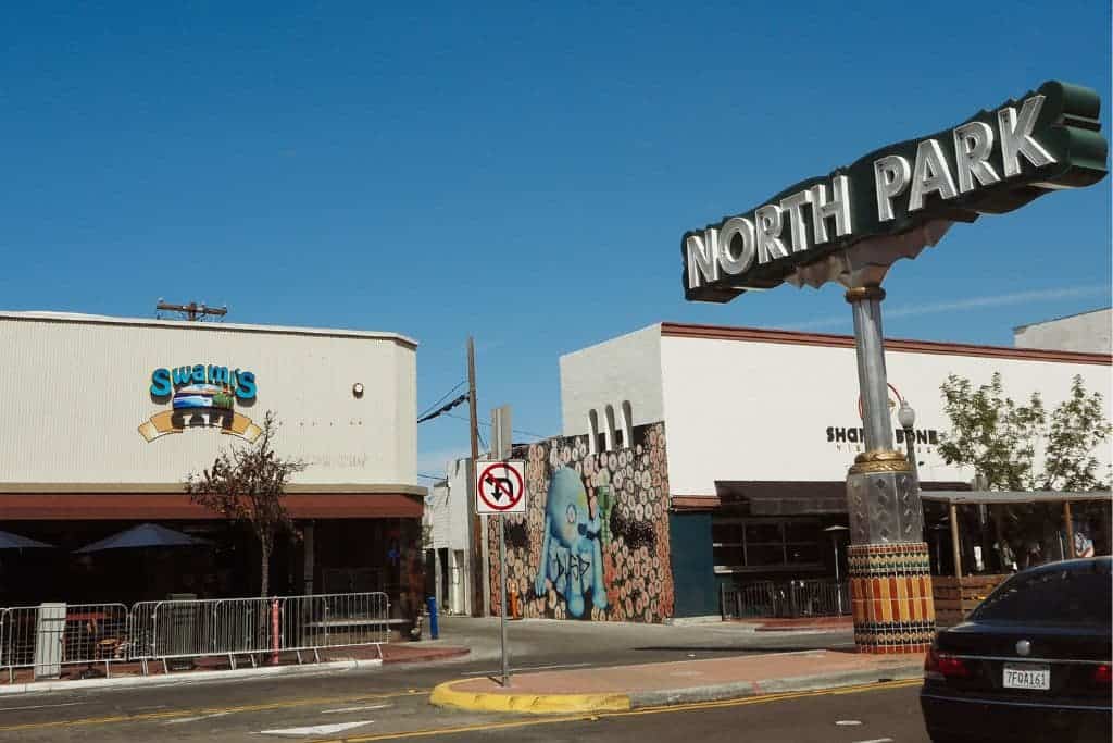 A picture of a street with a huge sigh that reads, "North Park."