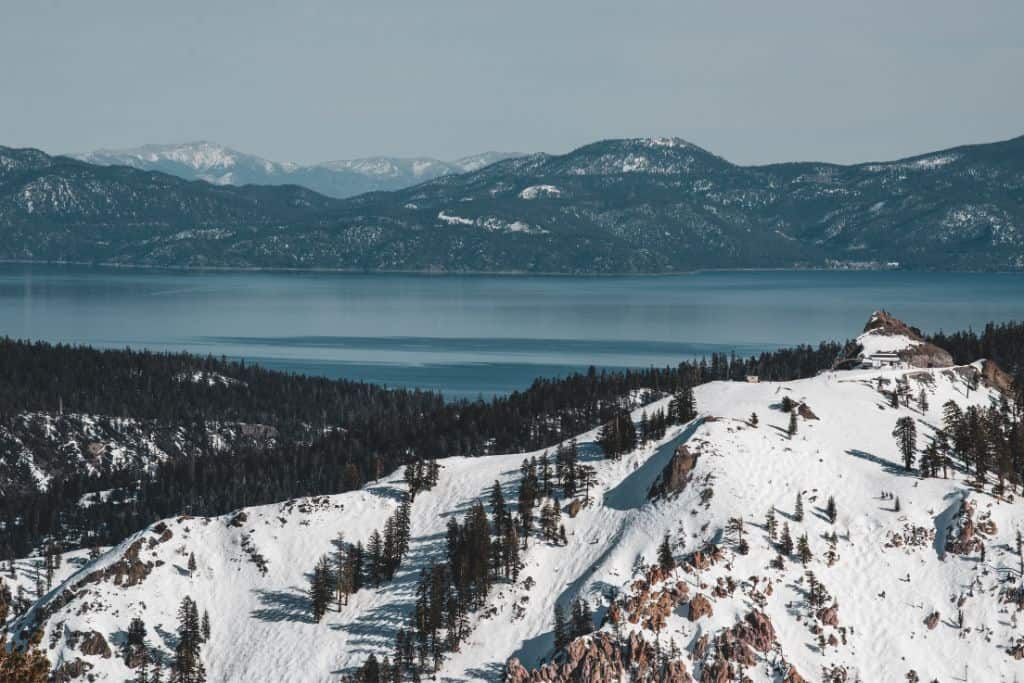 A snowy mountain and a lake in the background. Lake Tahoe, California. 