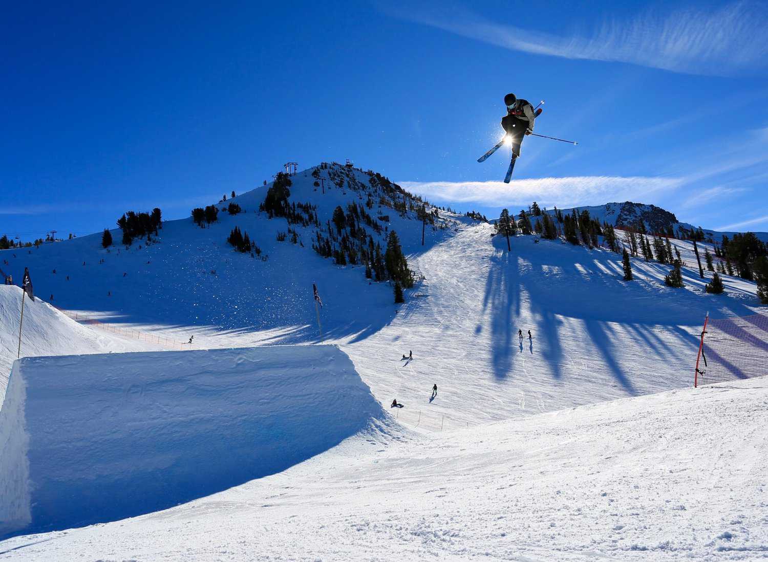 A skier in the air on Mammoth Mountain in California. Mammoth Mountain received the most snow in 2023. A whooping 700 inches of snowfall.